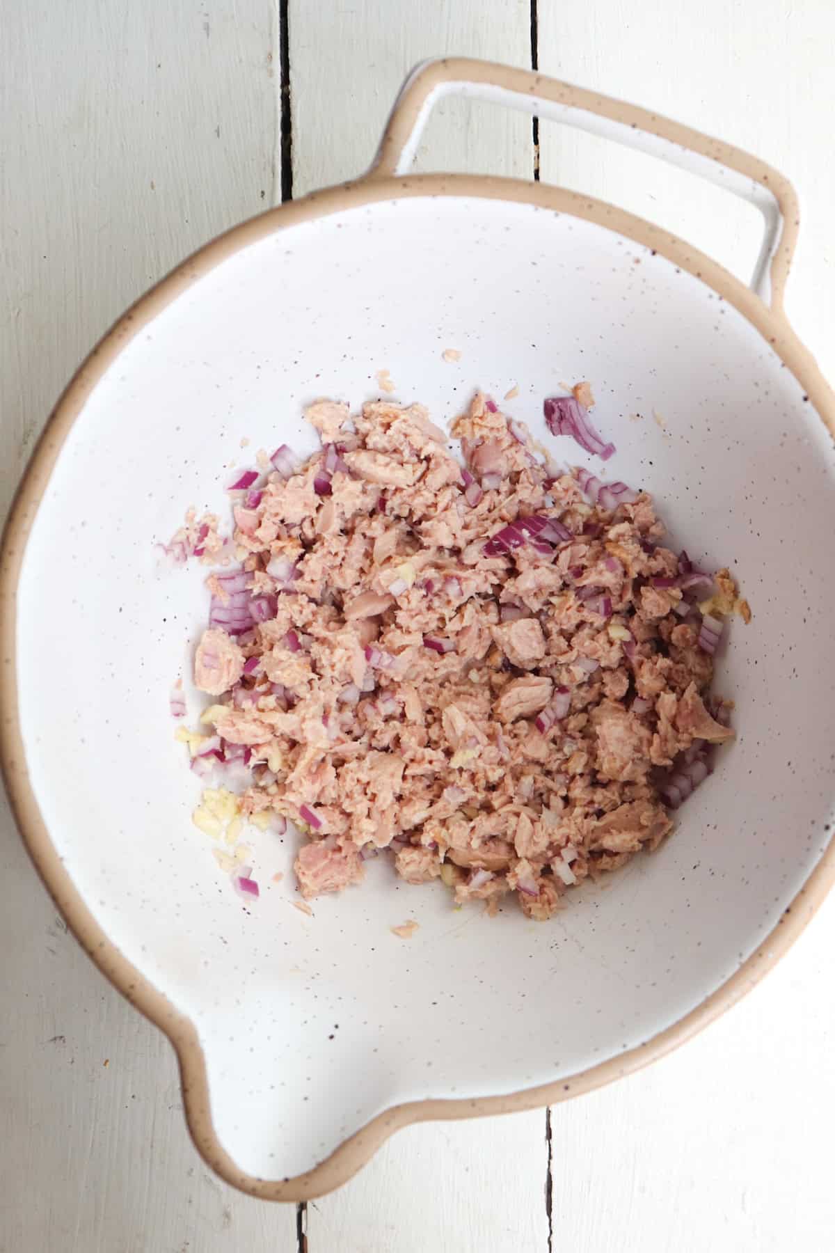 tuna broken up in large mixing bowl.