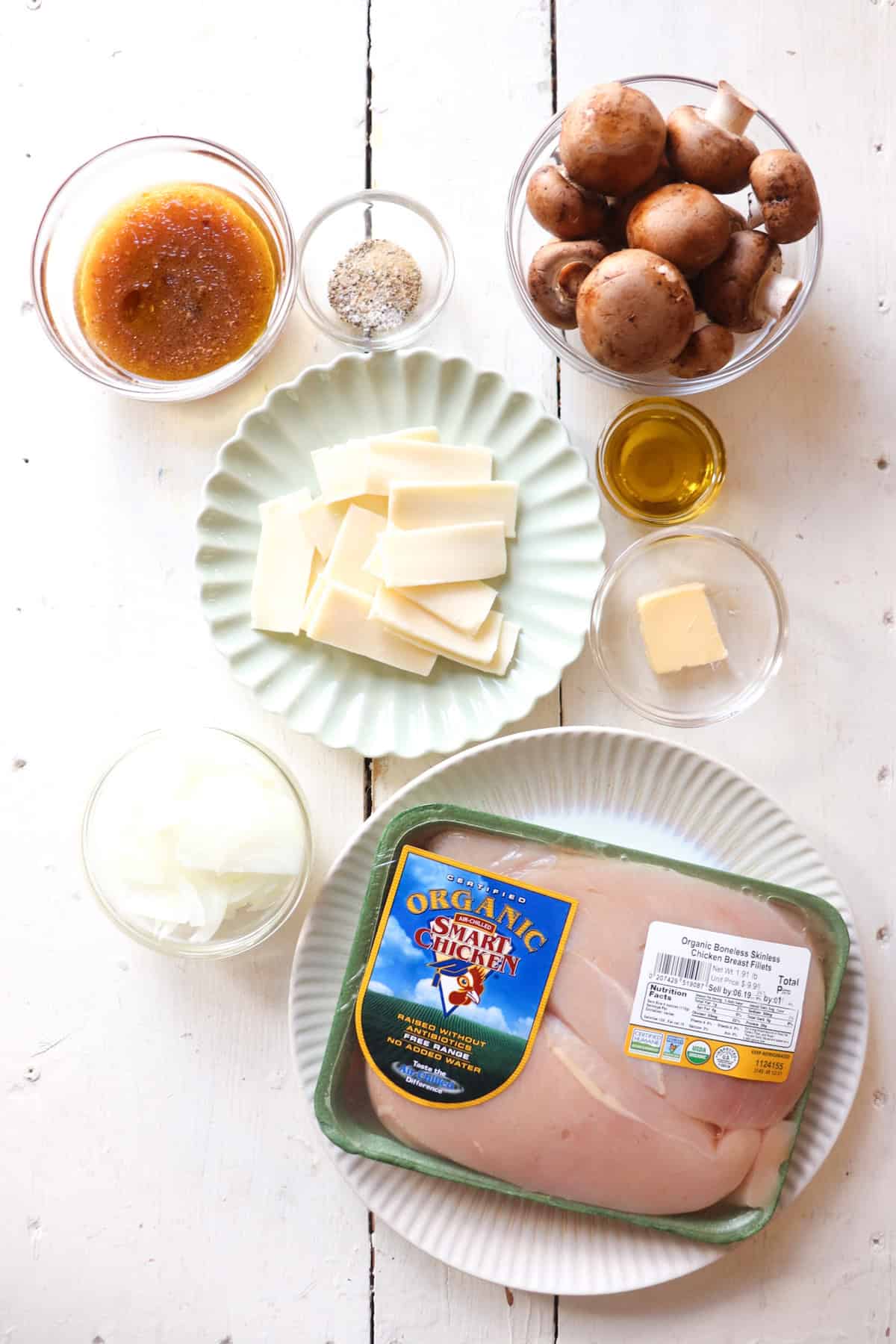 ingredients for texas roadhouse smothered chicken on a white background.