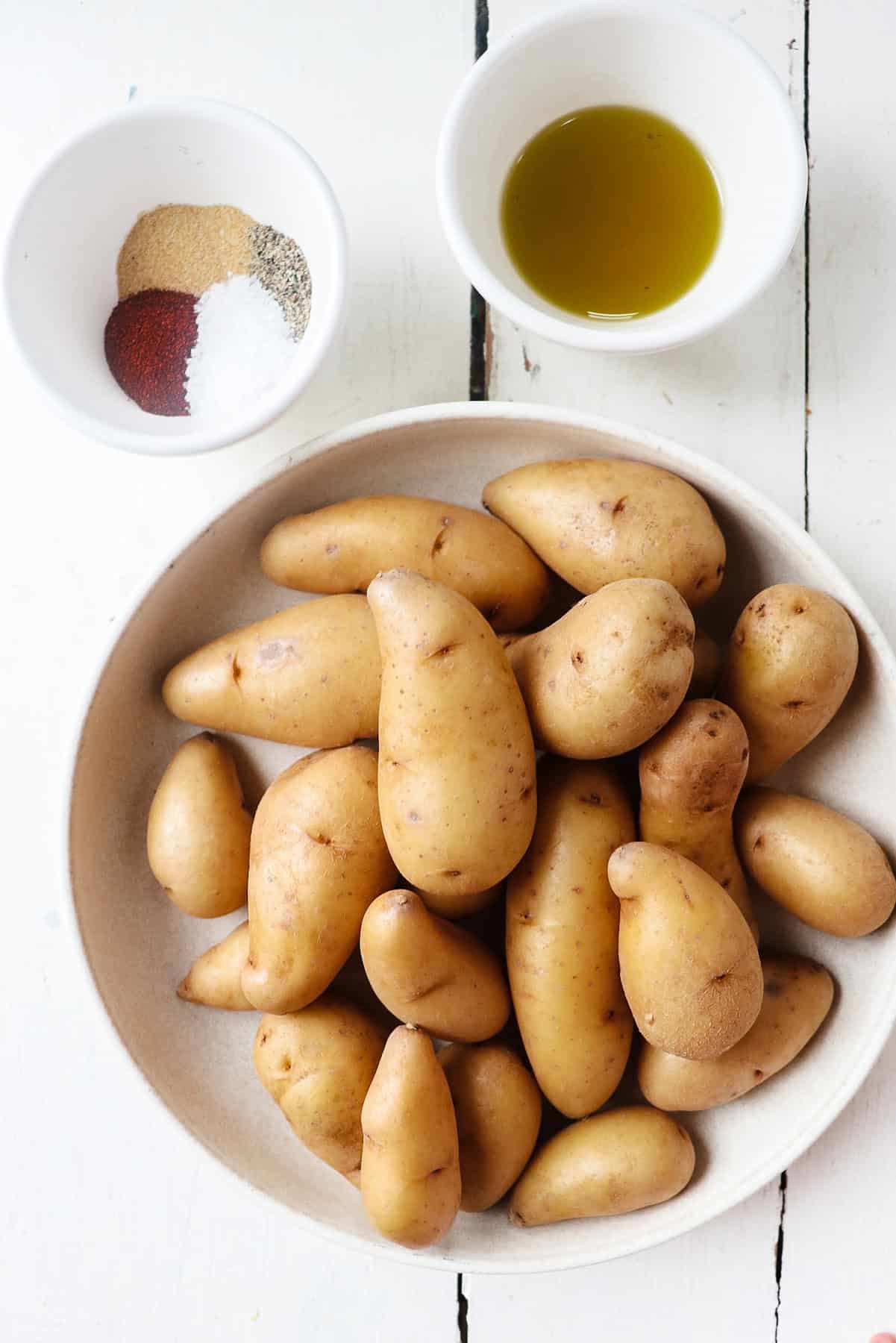 Whole potatoes with seasoning ingredients.