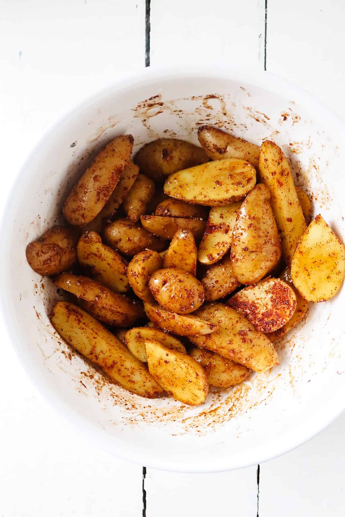 Fingerling potatoes with oil and spices.