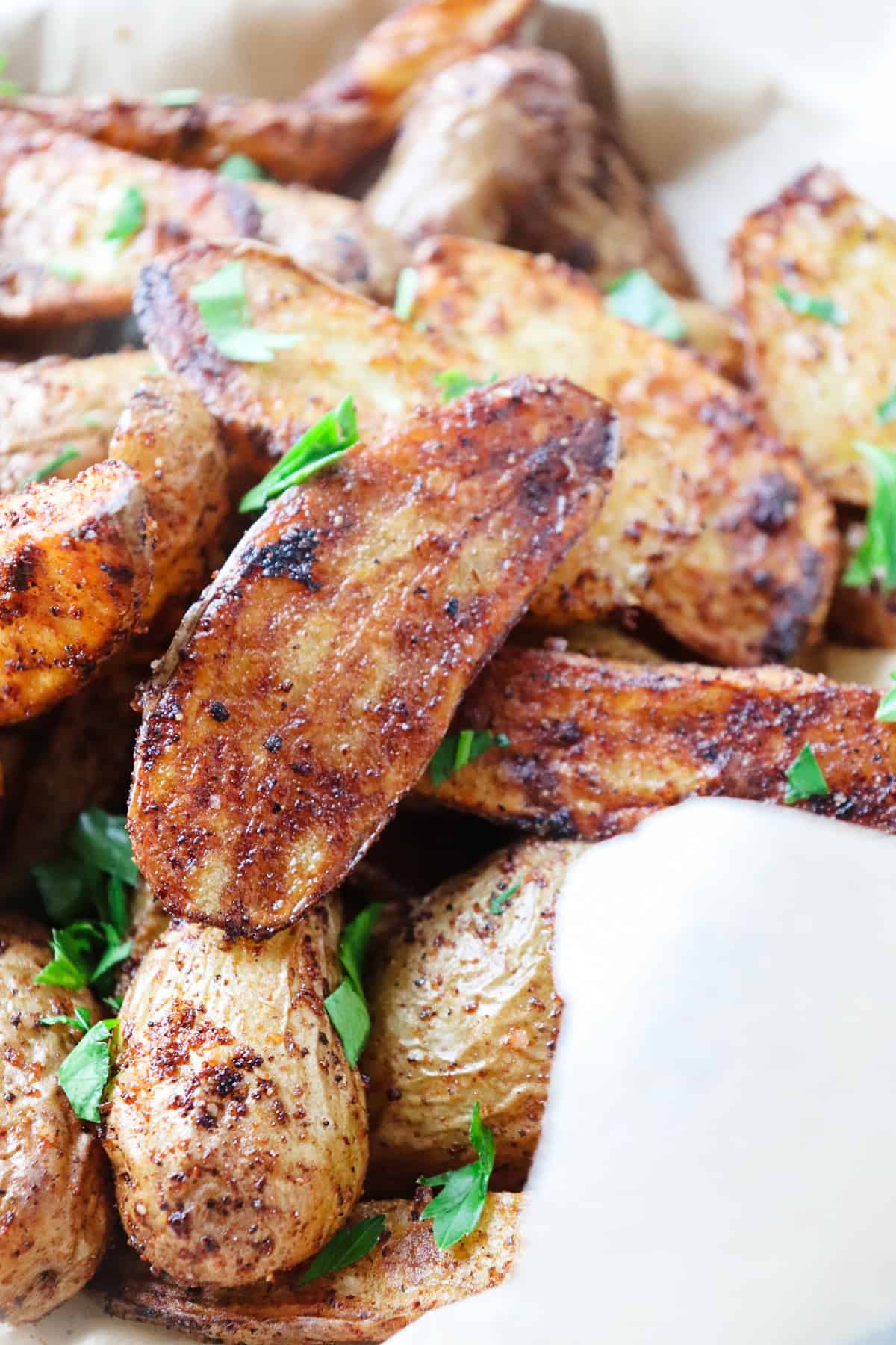 Closeup of air fryer fingerling potatoes.