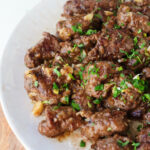 Plated beef tenderloin tips.