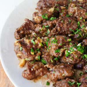 Plated beef tenderloin tips.