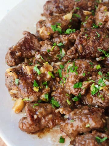 Plated beef tenderloin tips.