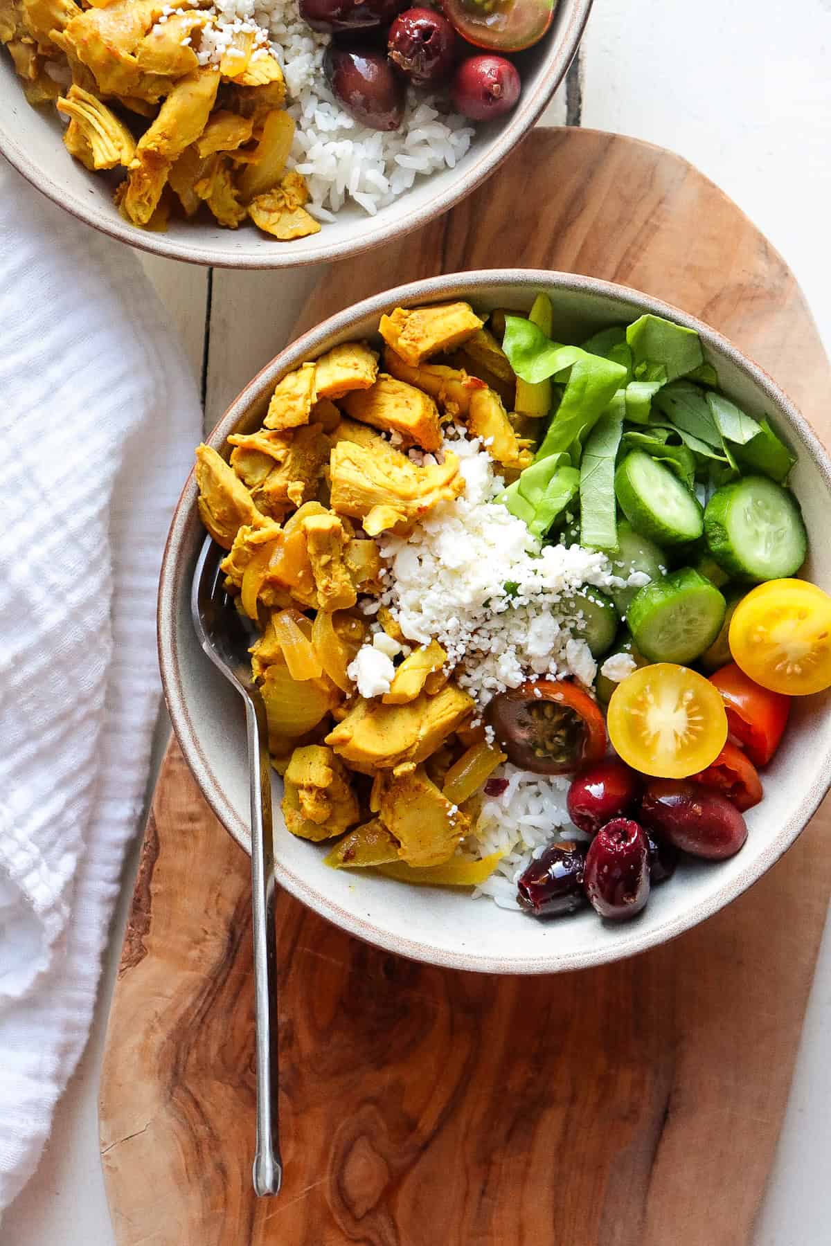 Bowl of chicken shawarma over rice.