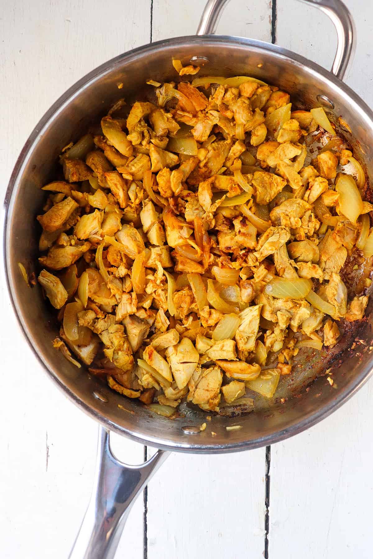 Diced chicken in crock pot.