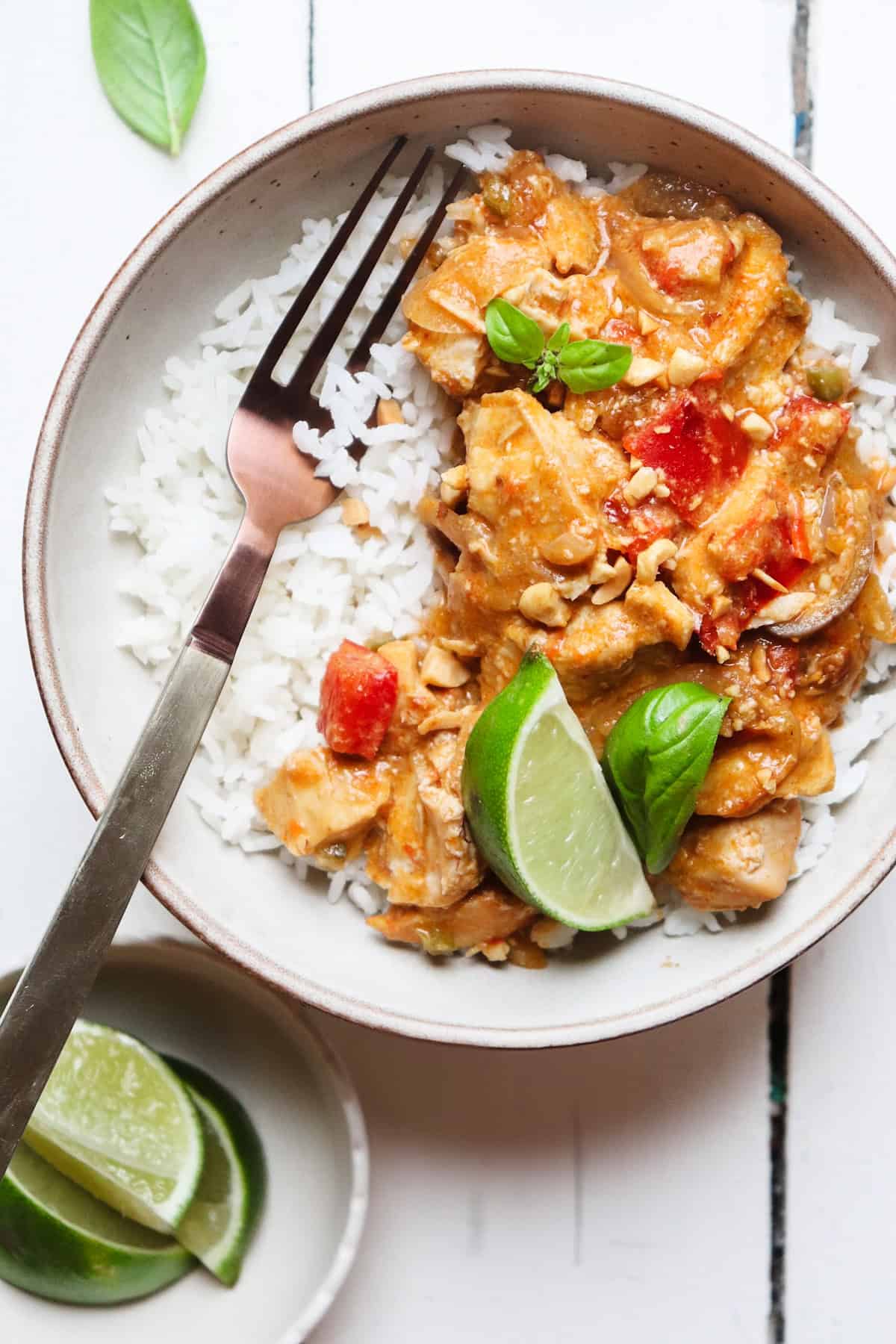 finished satay dish plated with a fork in the bowl.