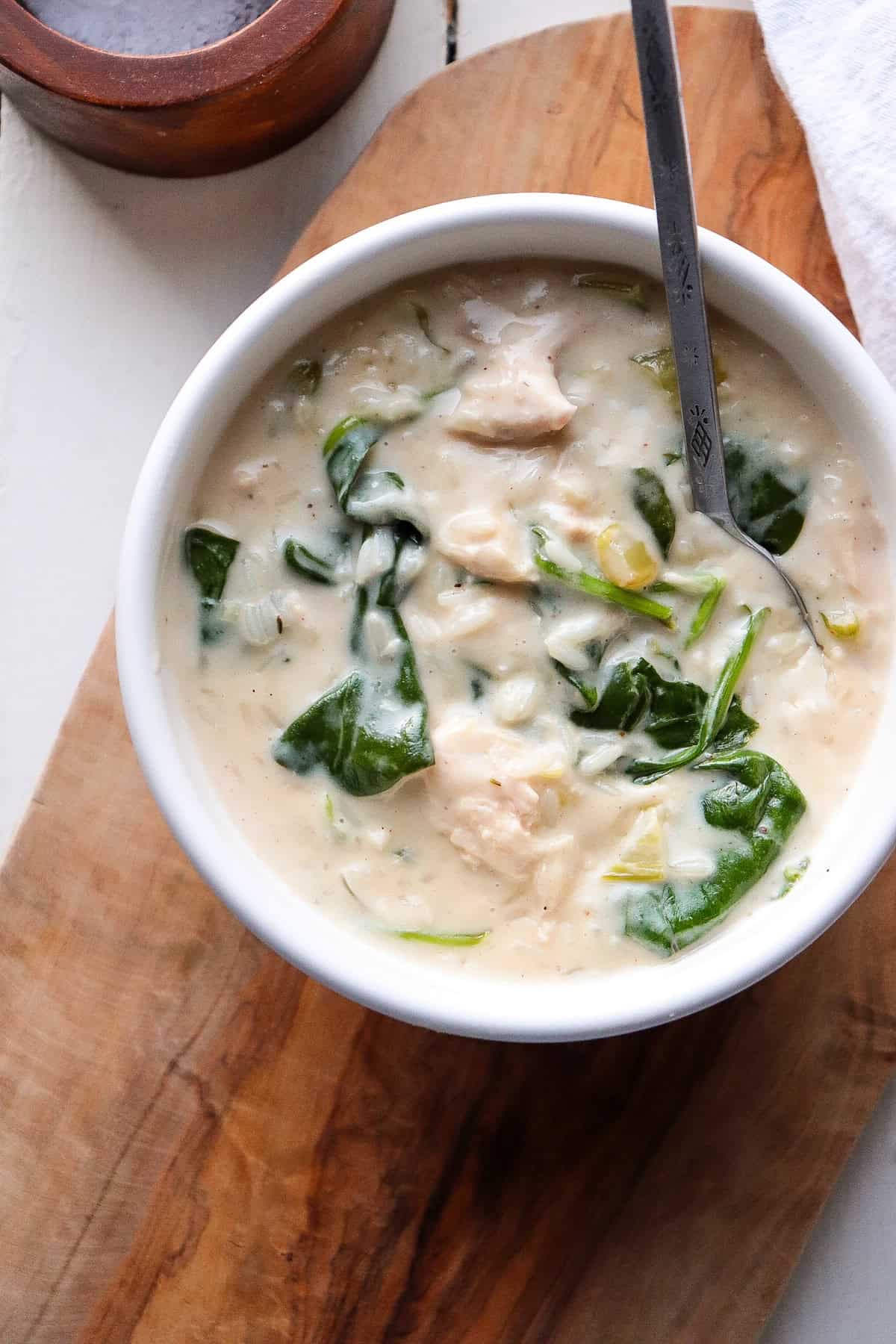 Bowl of creamy chicken florentine soup.