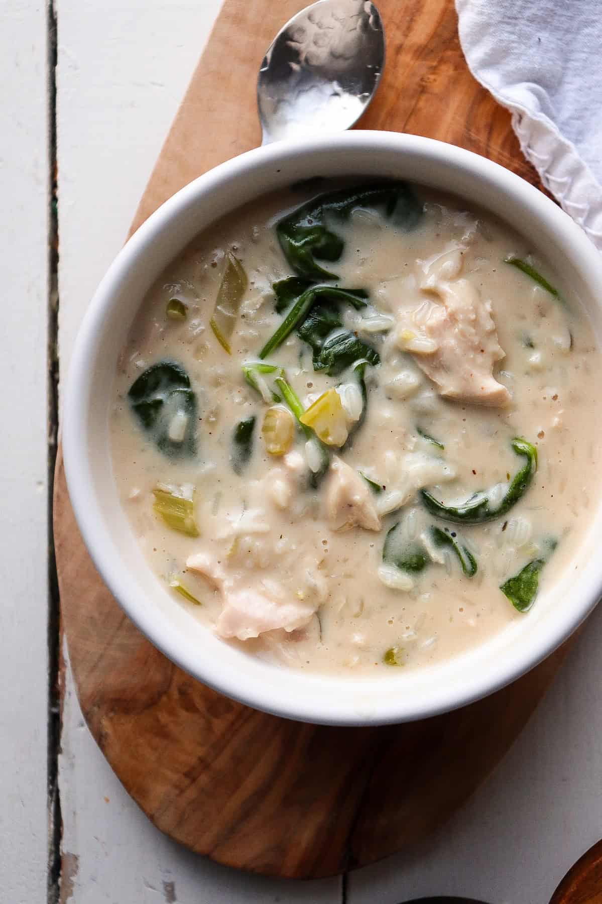 white bowl filled with chicken florentine soup.