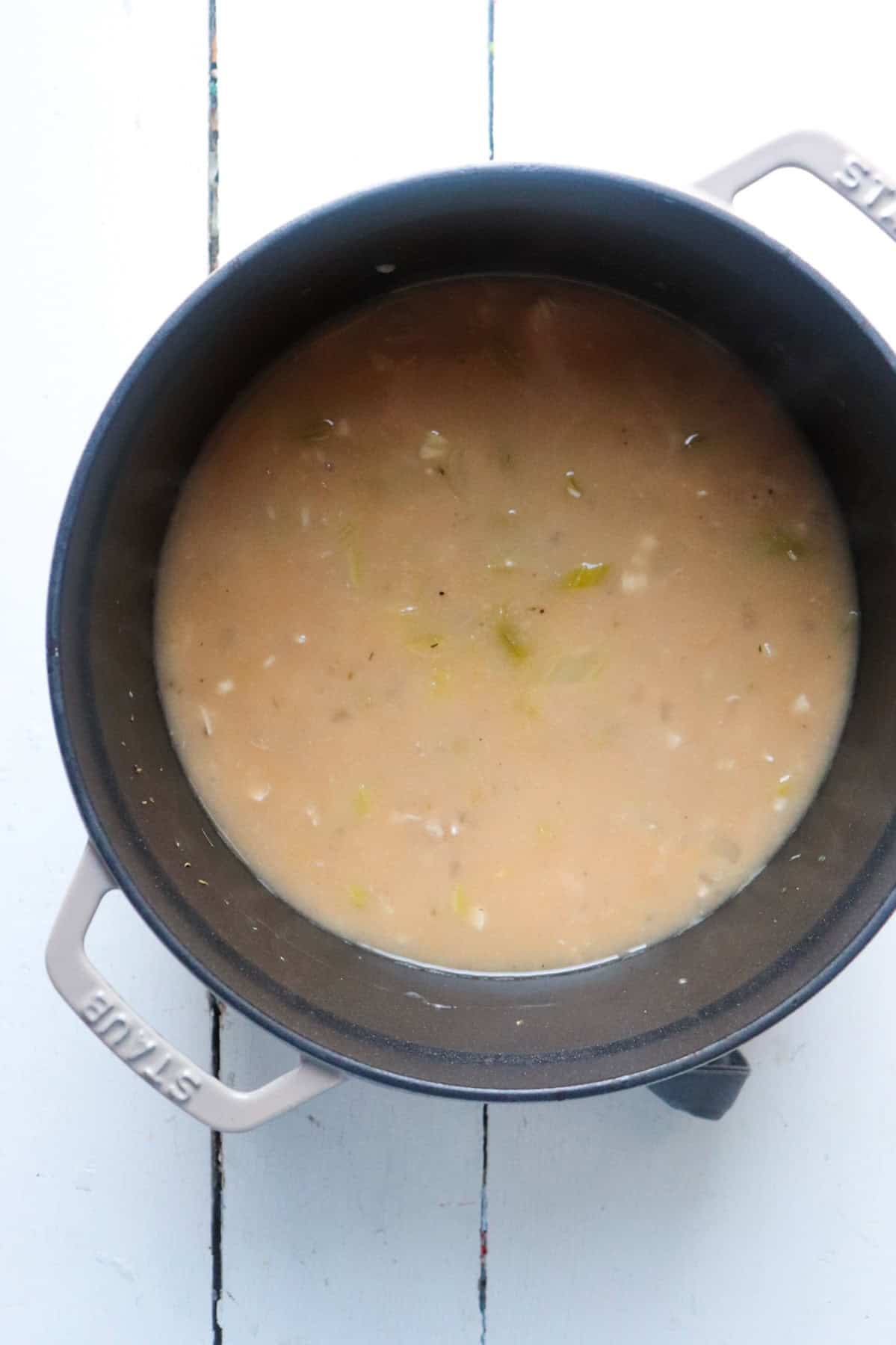 broth simmering in soup pot.