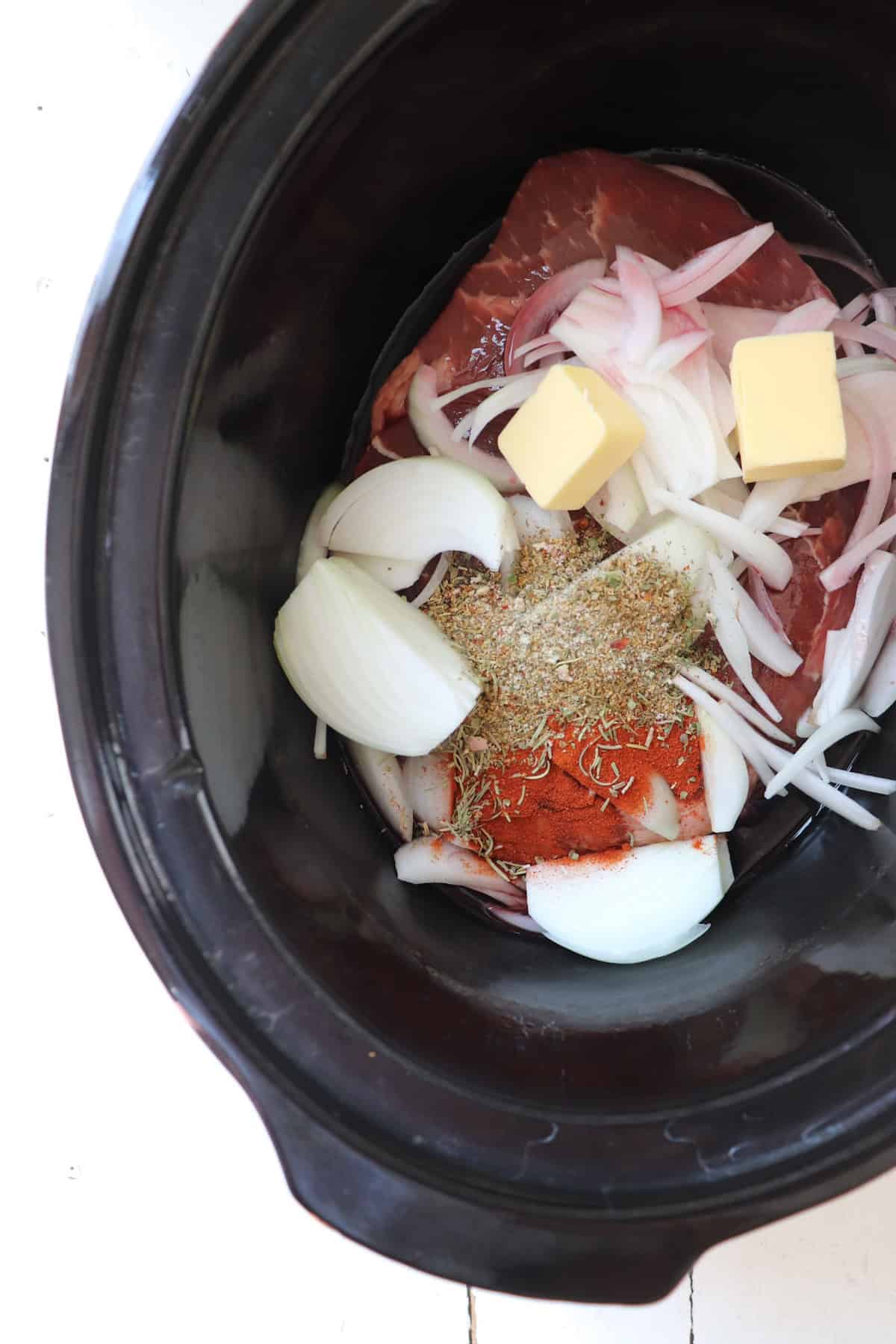 all ingredients for sirloin tip roast added to crock pot.