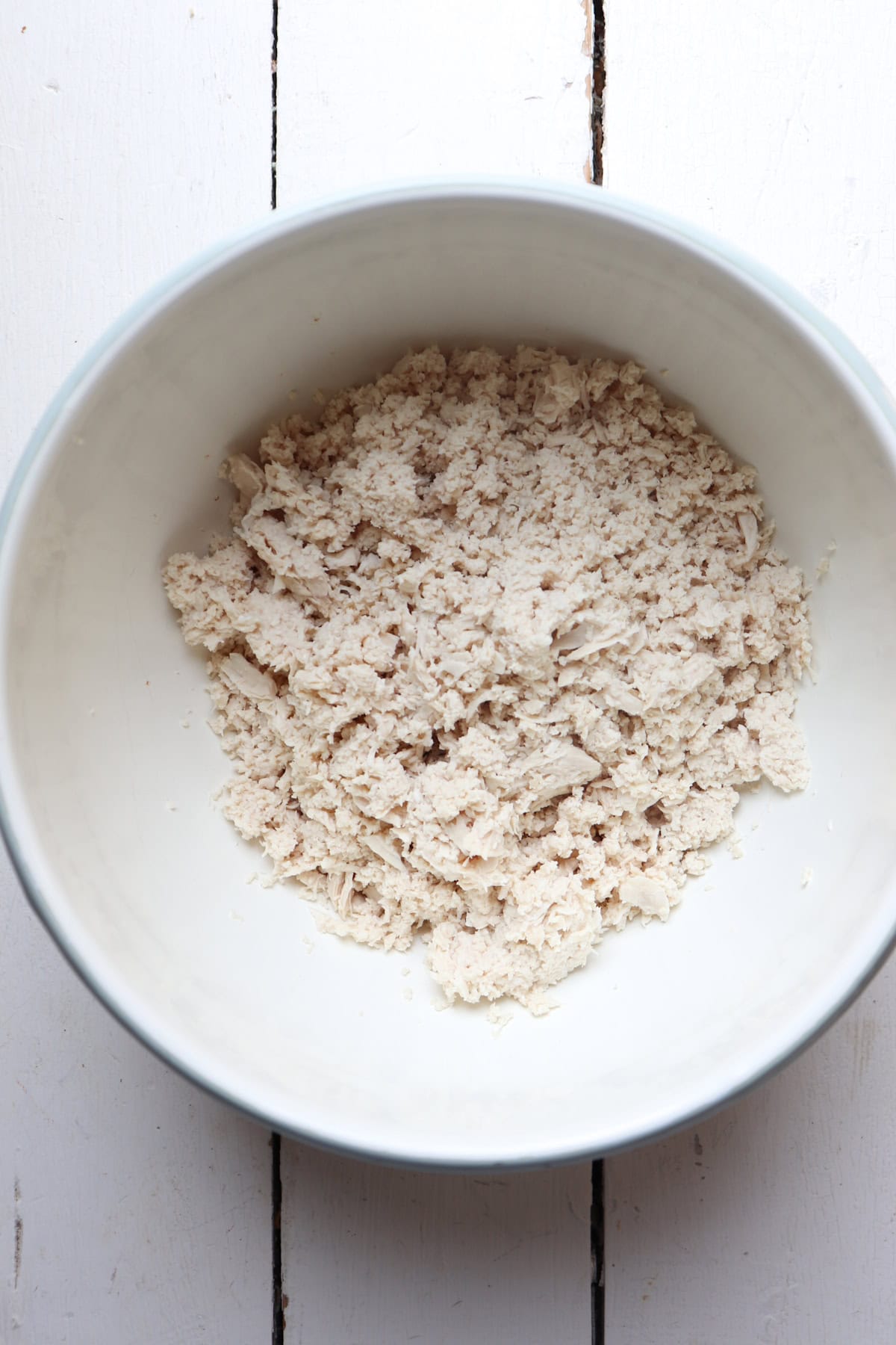 shredded chicken breast in bowl.