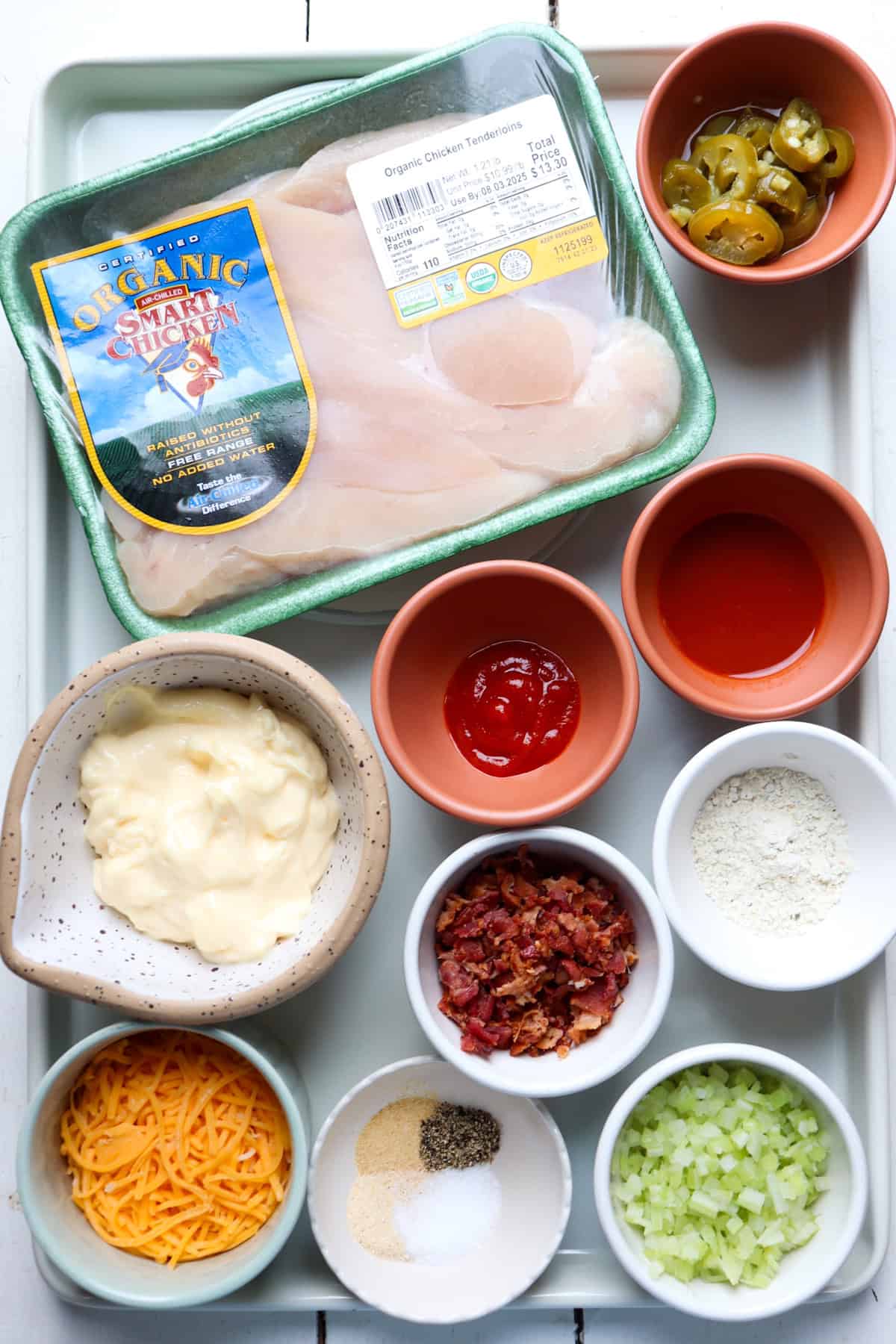 ingredients for kickin kay lynne chicken salad on a white tray.