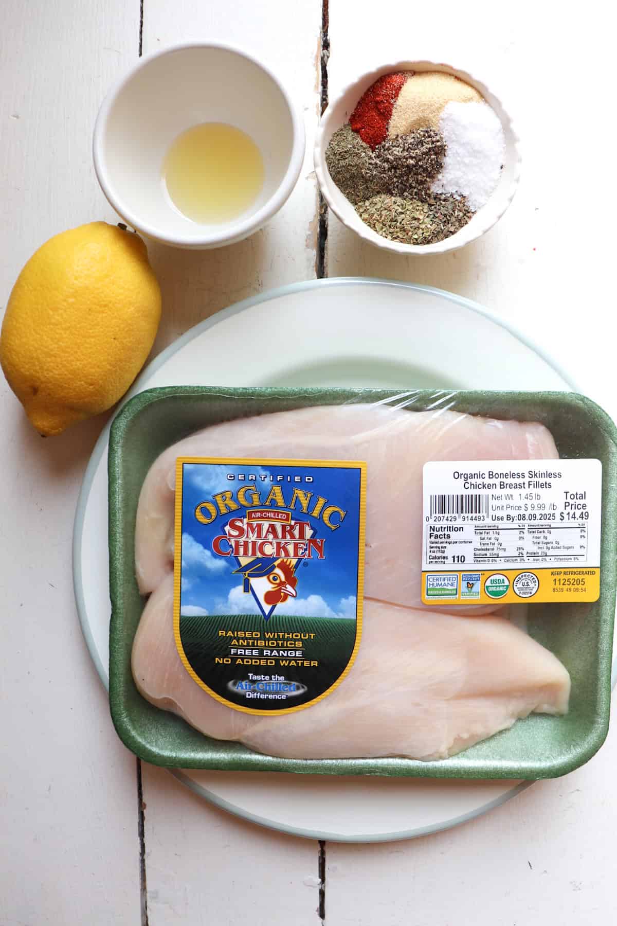 ingredients for texas roadhouse herb crusted chicken on a white table.