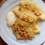 cinnamon apples on crepes with whipped cream.