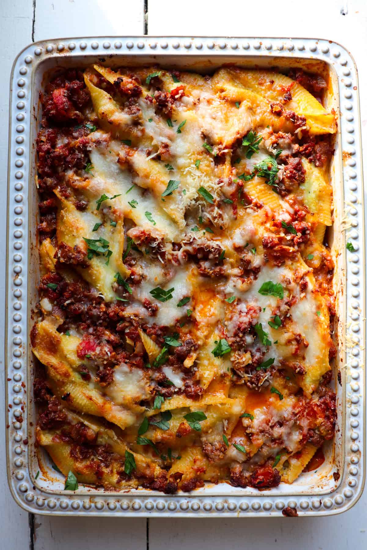 pan of meat ricotta stuffed shells after baking in oven.