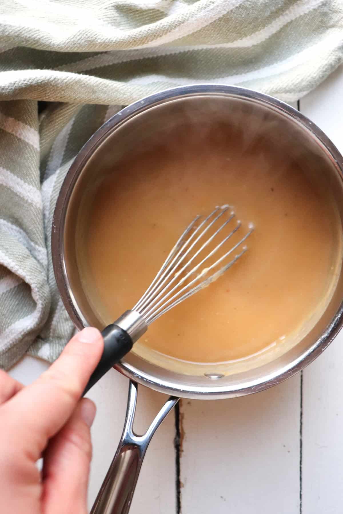 whisk stirring finished gravy.