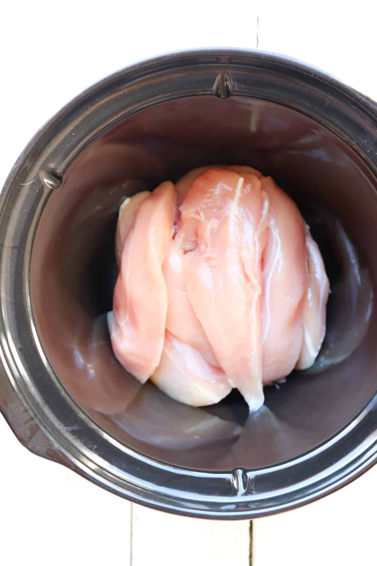 raw chicken in slow cooker.