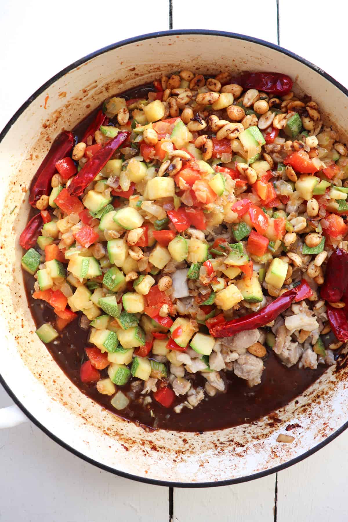 ingredients added back to the pan with the sauce.