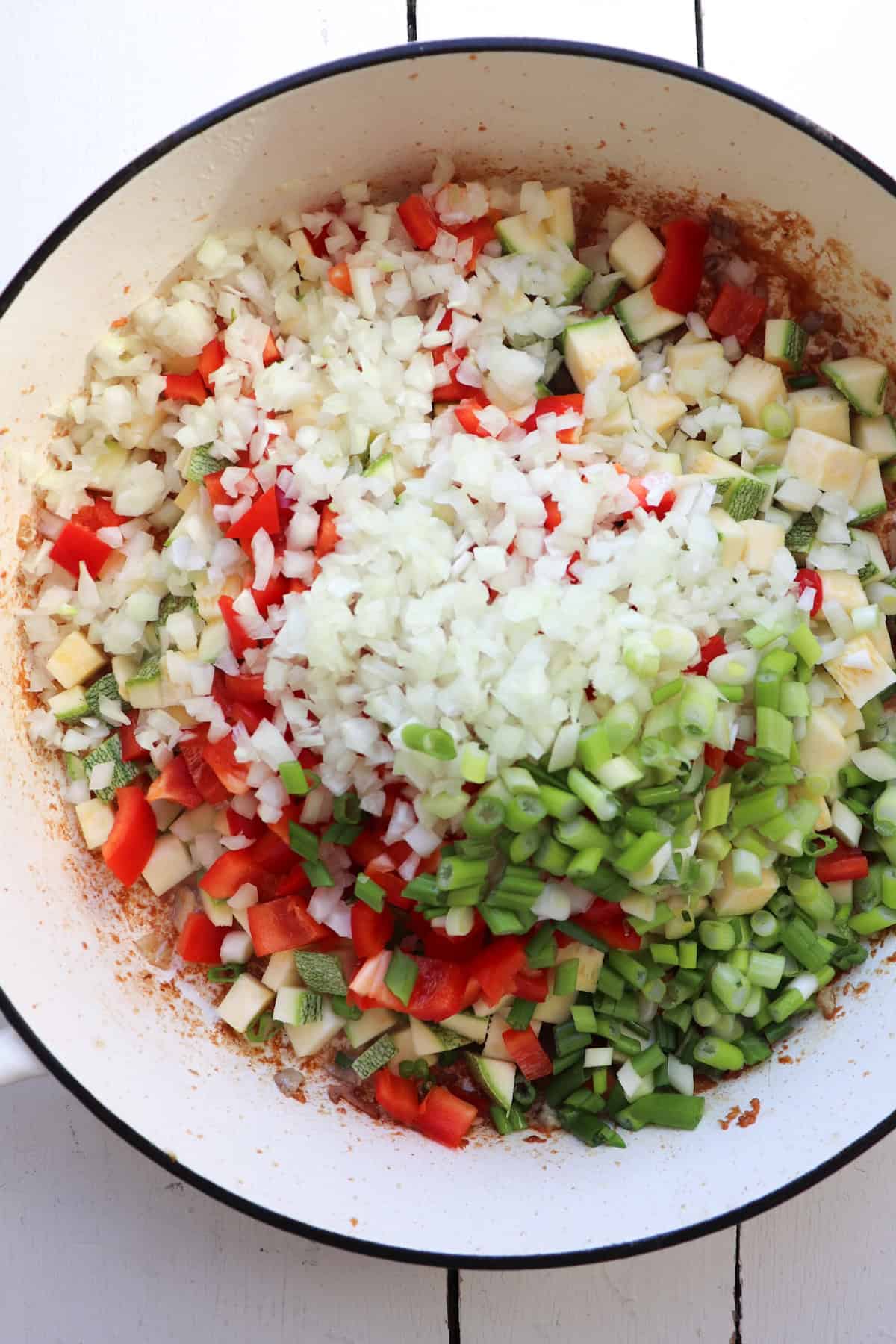 kung pao vegetables added to skillet.