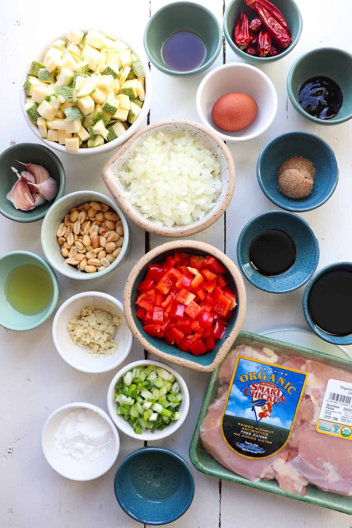 ingredients for panda express kung pao chicken on a white table.