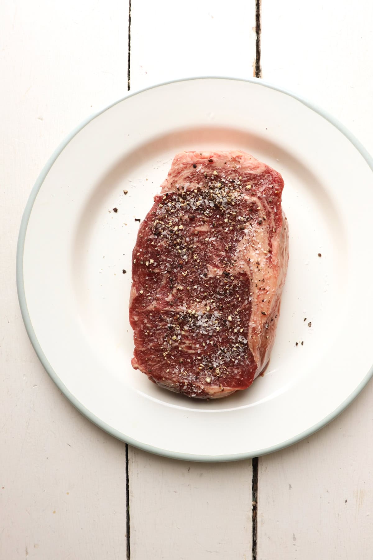ribeye steak on plate.