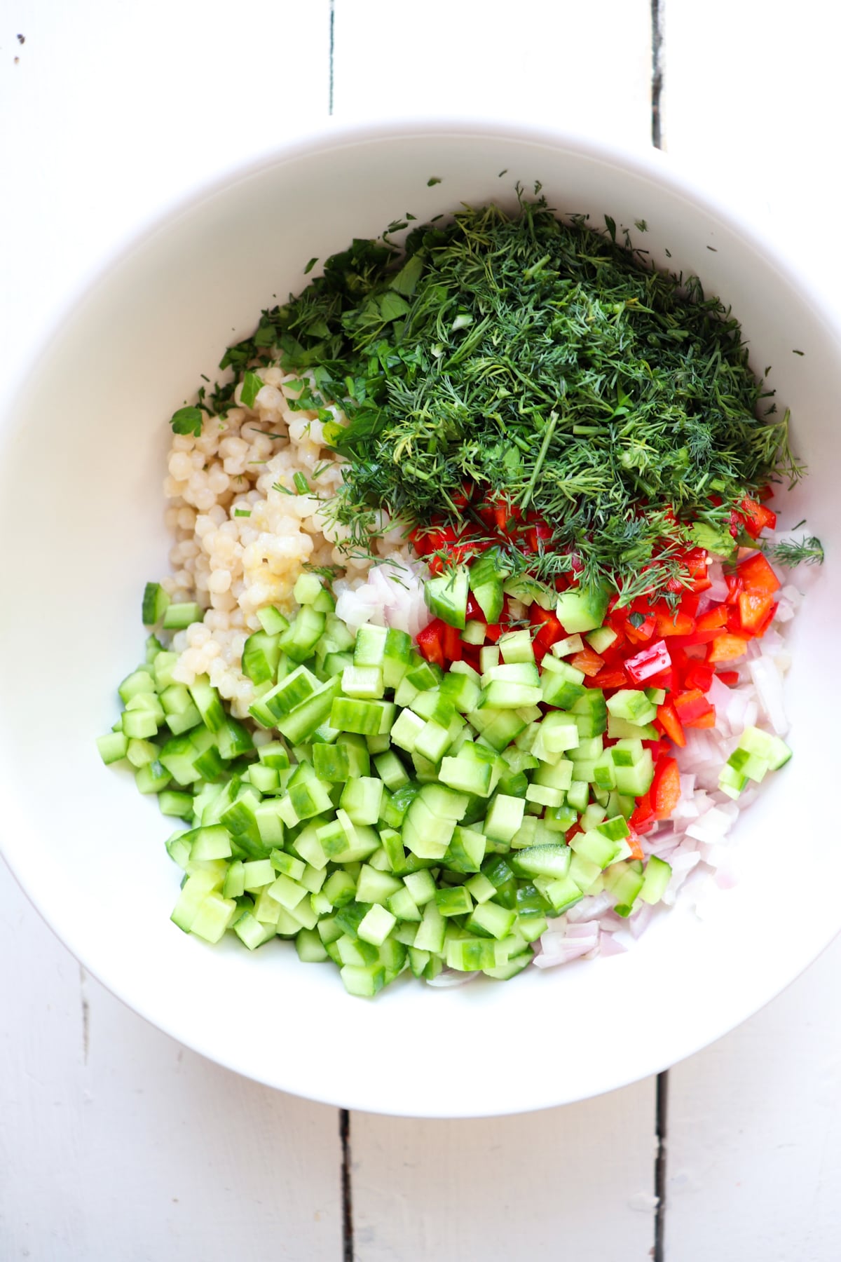 ingredients for couscous salad that is unmixed.