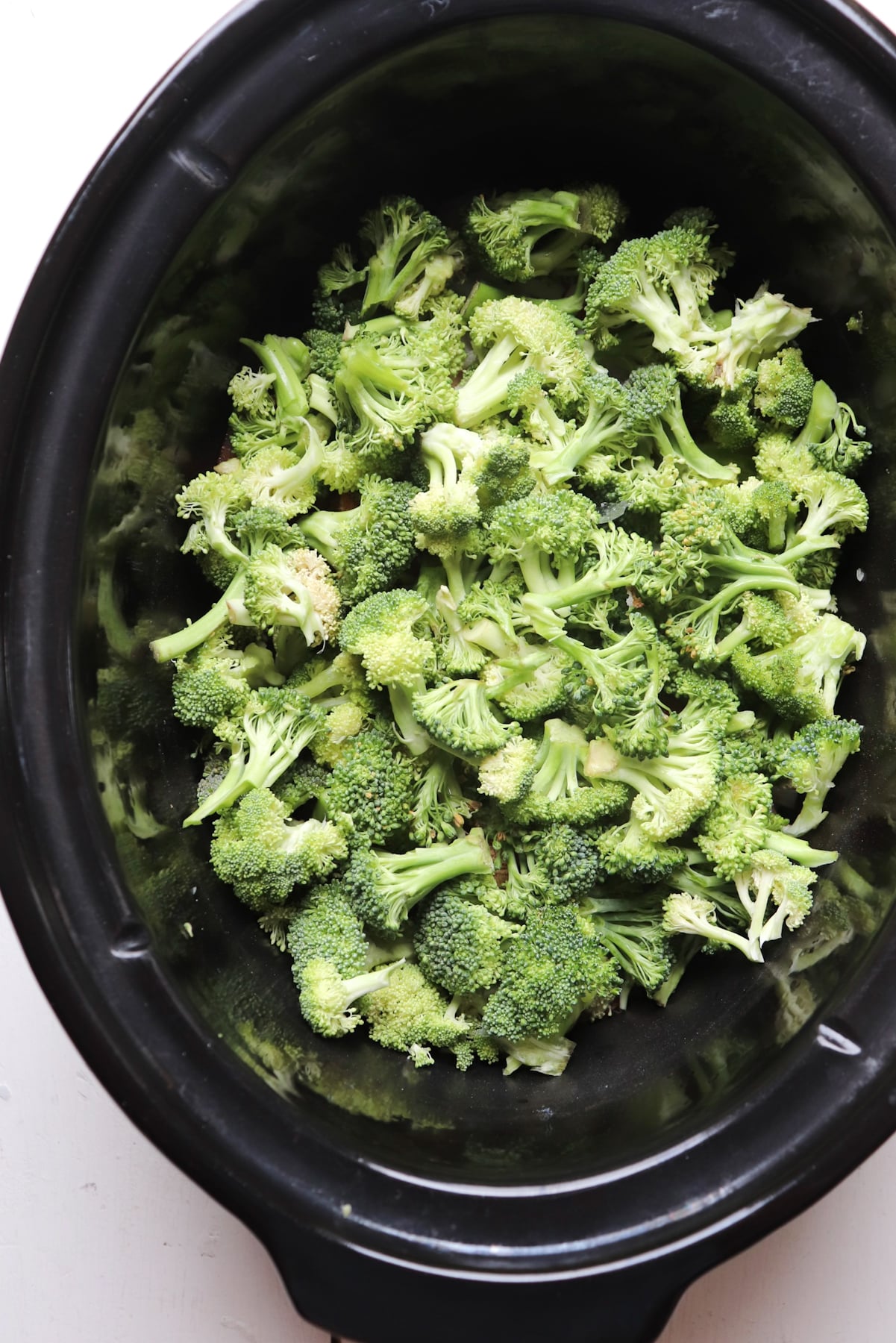 raw broccoli in crockpot.