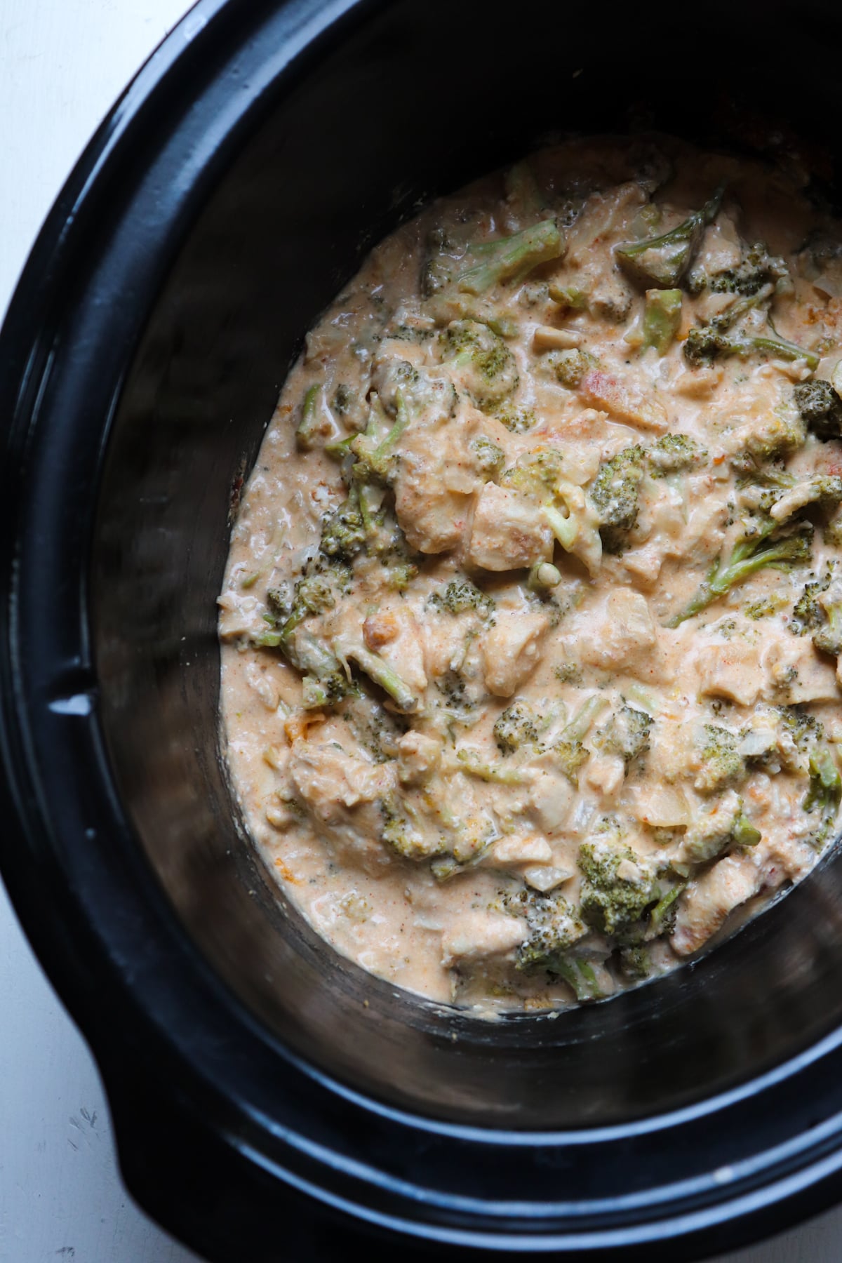 cooked chicken broccoli in crockpot.