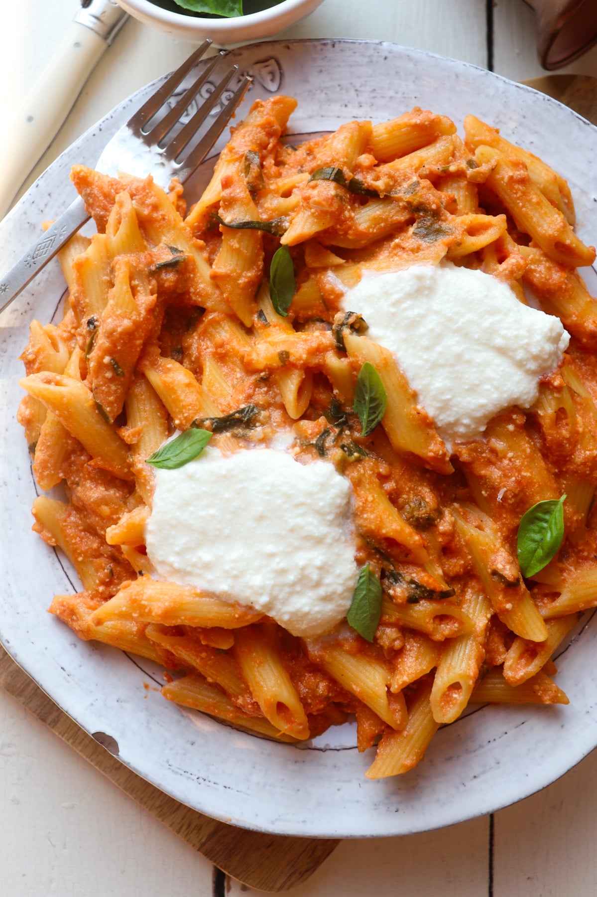 cheesecake factory four cheese pasta topped with dollops of ricotta cheese.