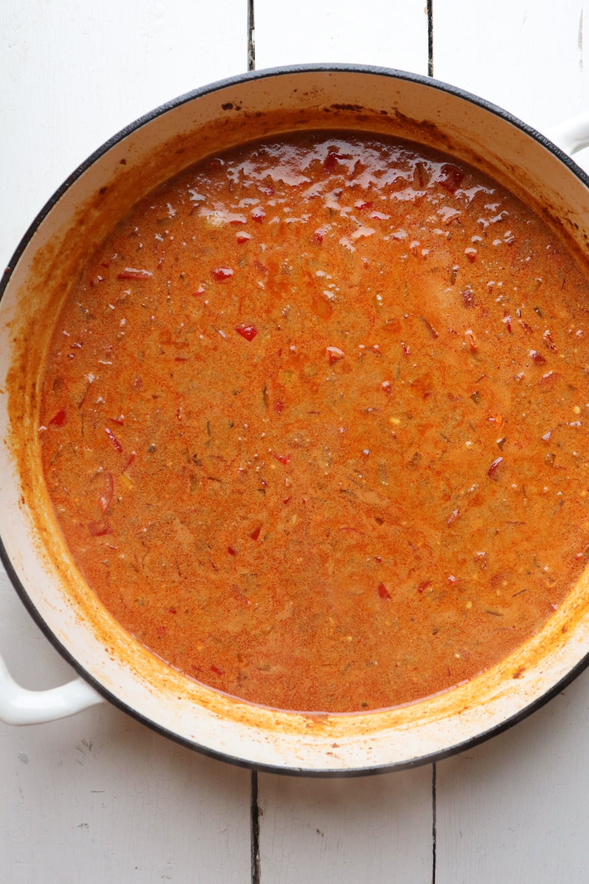 chorizo cream sauce in pan.