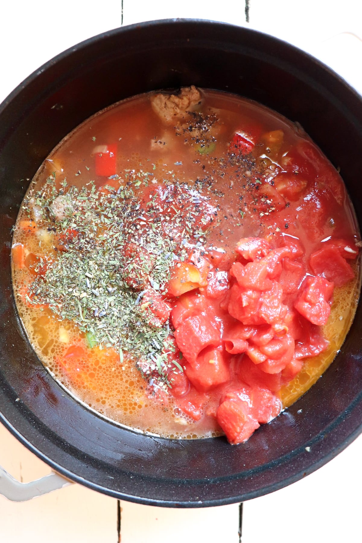 ingredients added to soup pot.