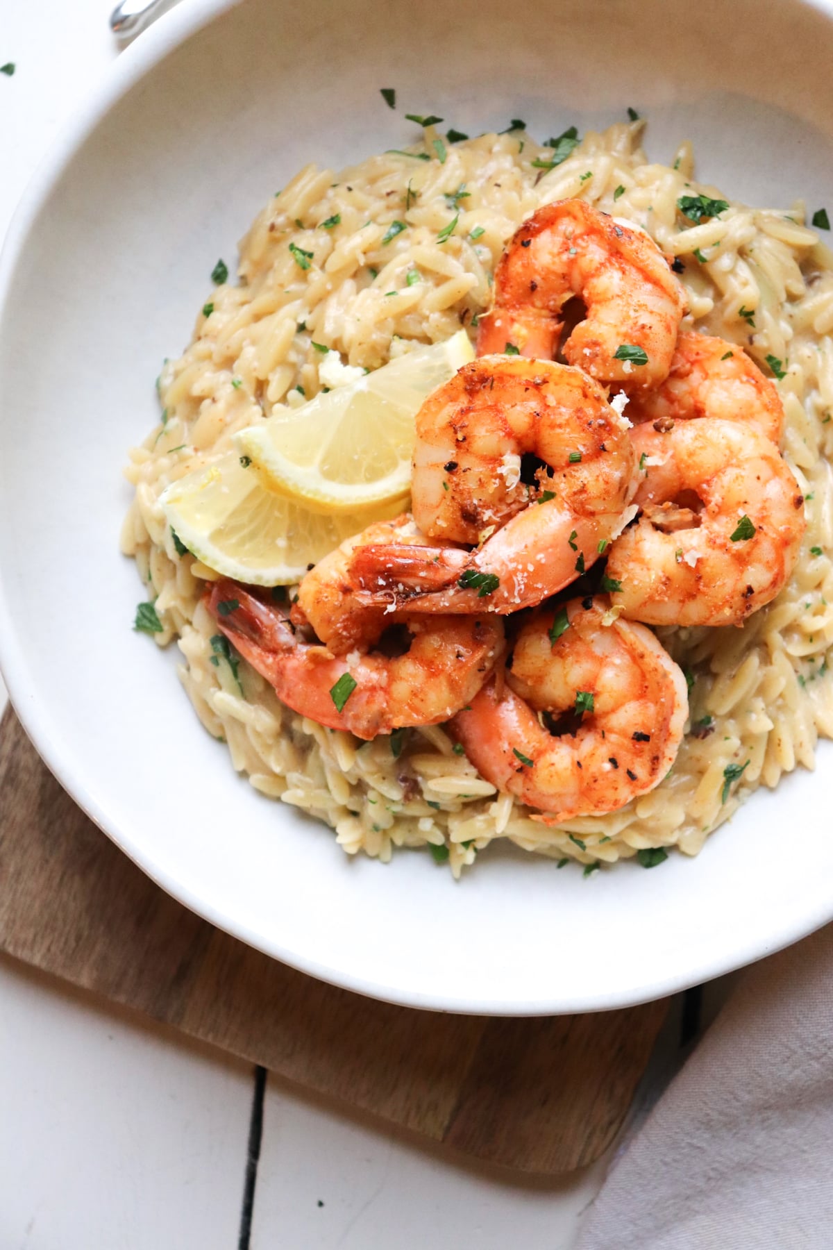 shrimp and orzo in bowl.