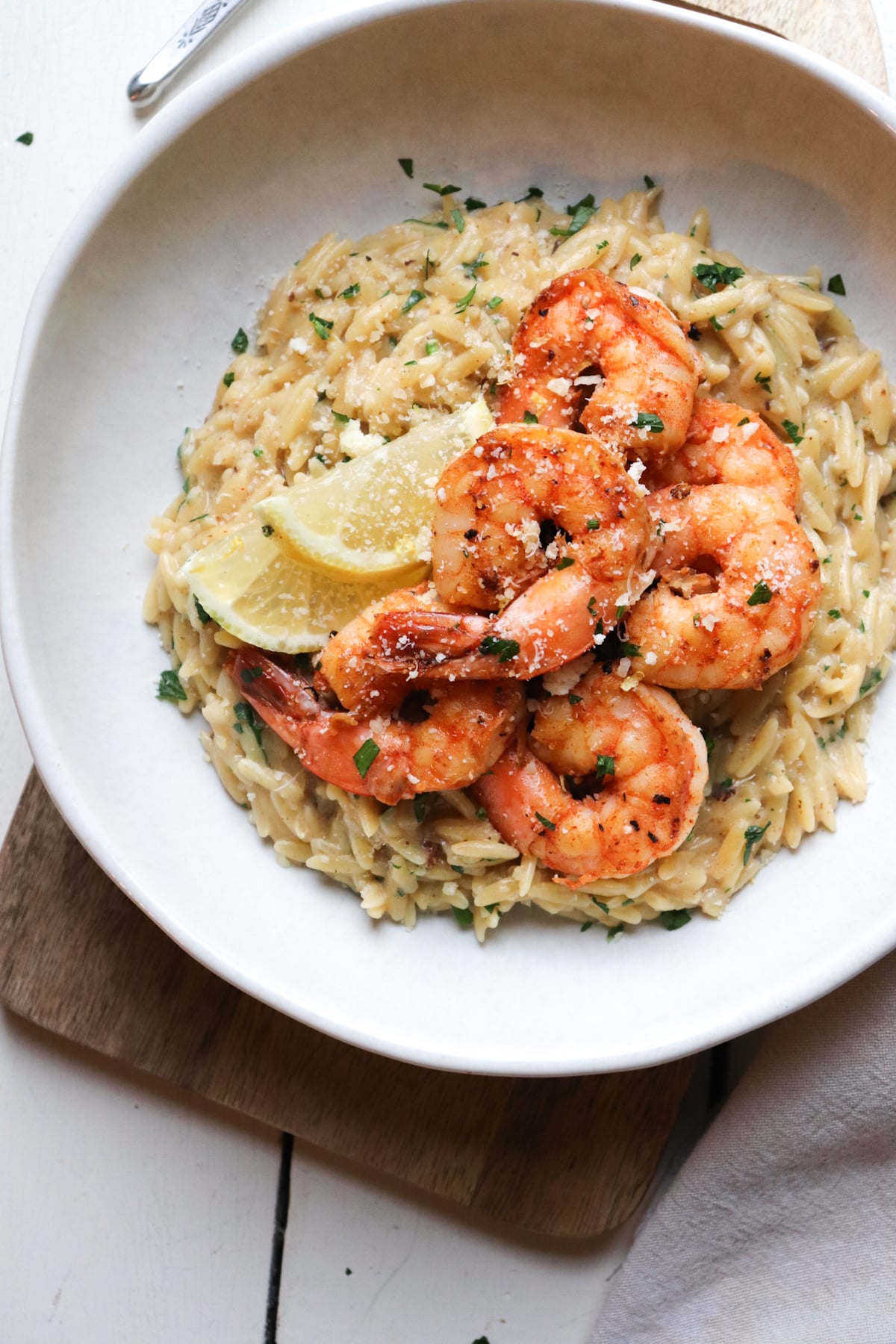 shrimp with lemon on orzo.